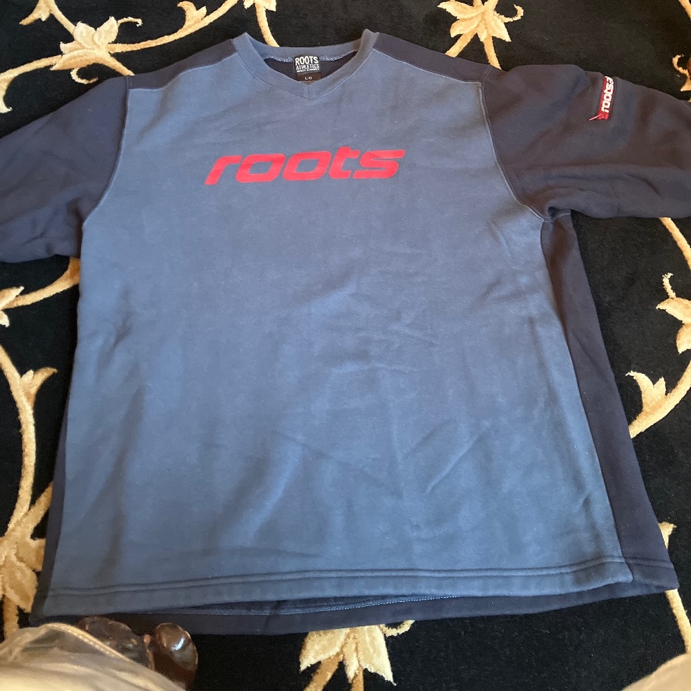 Vintage 1990s Roots V-neck comfy sweatshirt.